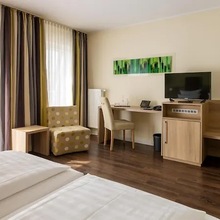 ホテル Am Schlosspark Garni フースム