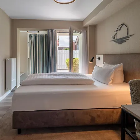 Am Schlosspark Garni ホテル フースム